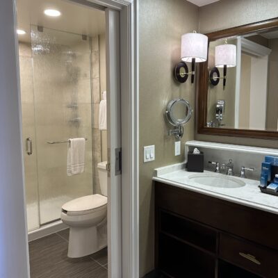 Bathroom in a Standard Two-Queen Room with Day Bed at Disney's Yacht Club Resort